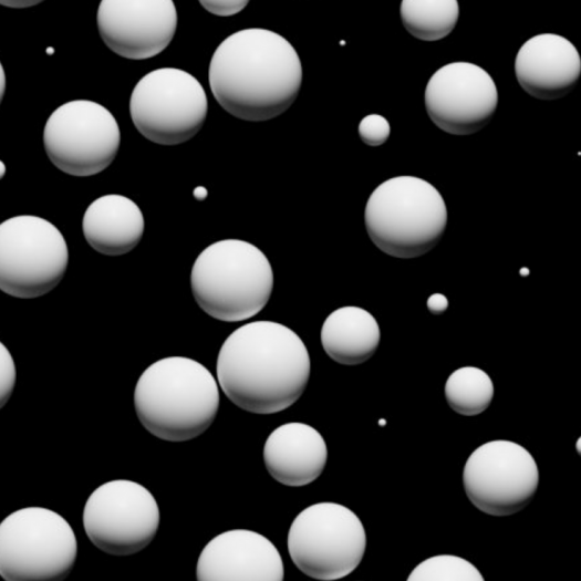 A digital image of many white spheres floating in black space