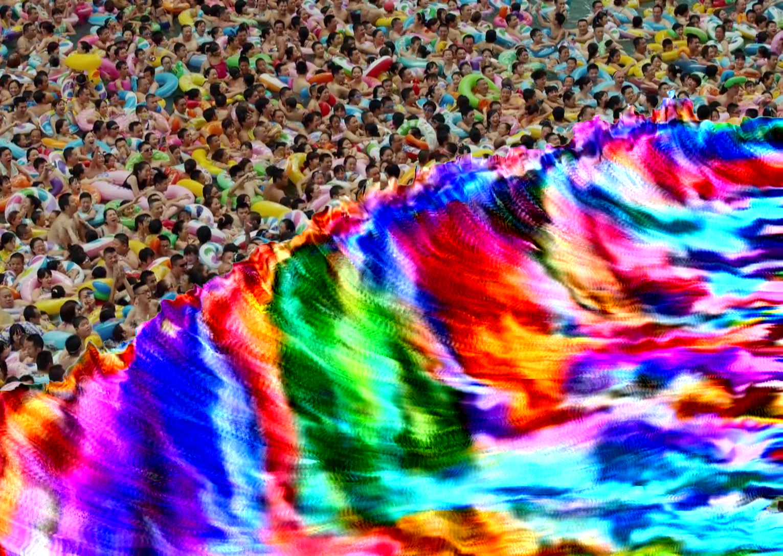 A digital image of a rainbow-colored wave, with a collage of beachgoers behind the crest