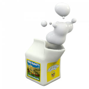 A 3D model of a milk cartoon with milk billowing up from the open mouth in big droplets