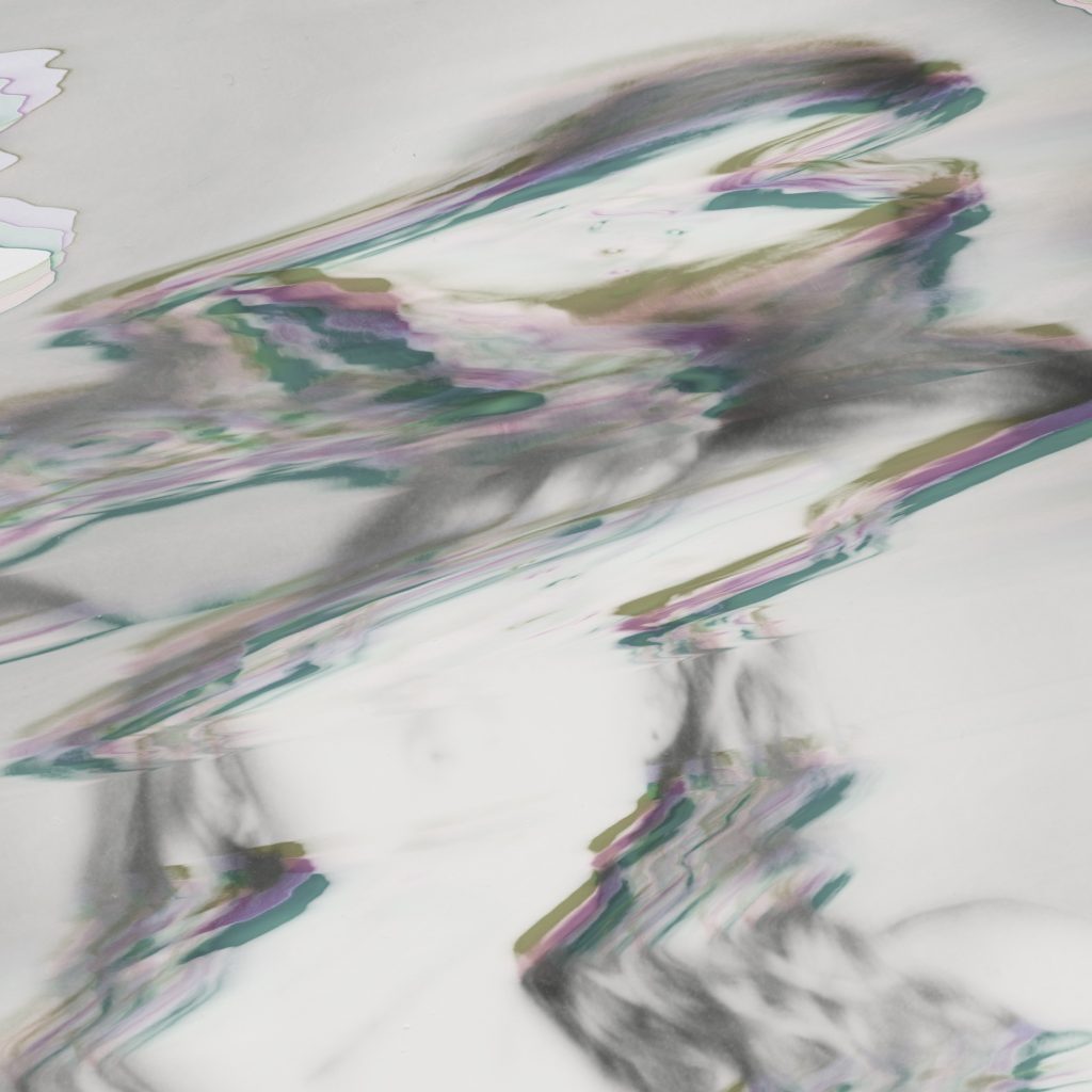 What used to be a photo of a woman, distorted beyond recognition