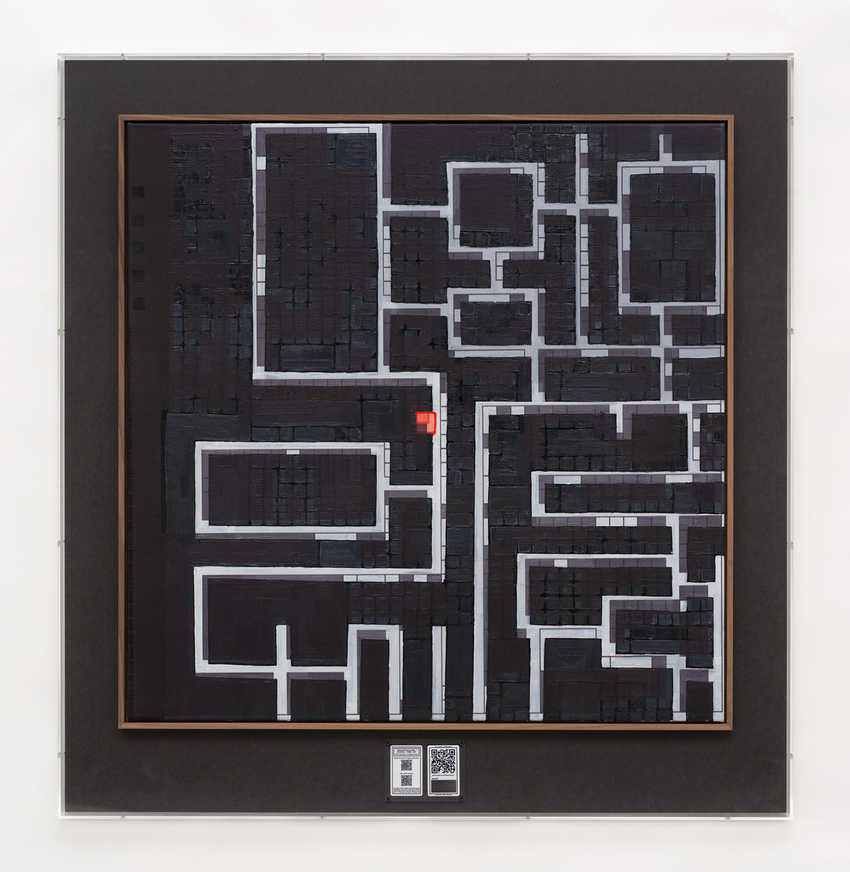 A square canvas painted black and showing a bird's eye map view of a plot of land on Decentraland