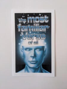 A photograph of a religious pamphlet, featuring the face of a blue man with smooth skin and blank eyes. The top of his head is cut off, and glowing stars flow up and out of it
